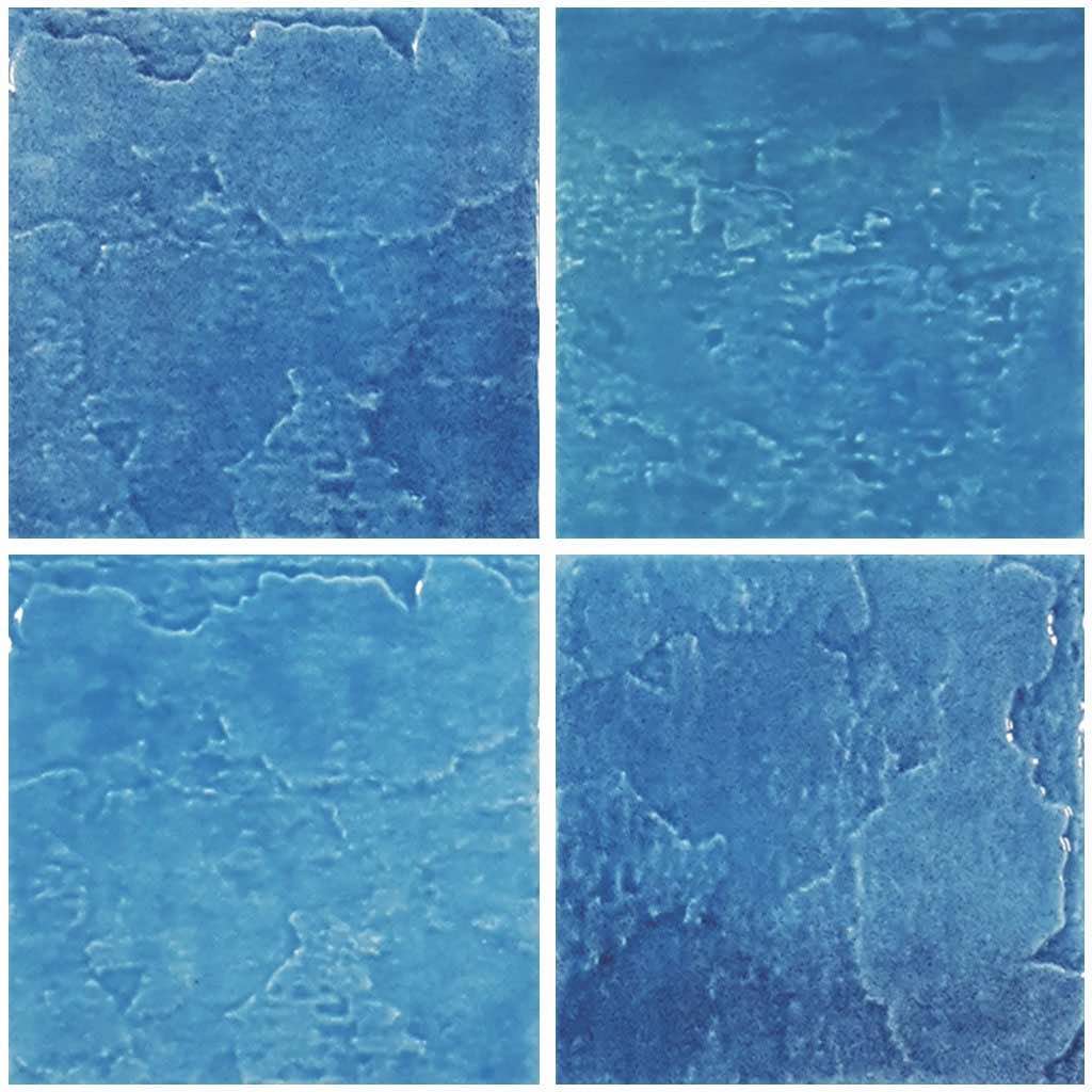 Are the actual tiles variegated as in the above photo?  The sample I got was monochromatic and a very bright blue.