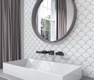 Urbana Fish Scale White Glossy Porcelain Tile featured on a bathroom backsplash