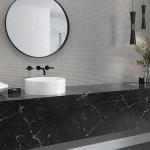 Urbana Penny Grey Glossy Porcelain Mosaic Tile featured on a bathroom wall