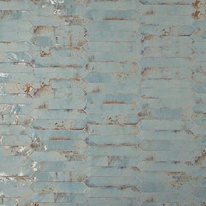 Vintage Distressed Picket Tile Rust 2x10 installed on a wall 