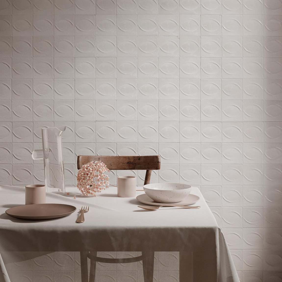 Storie Distressed Tile White 4x4 Deco Egg featured on a dining room accent wall