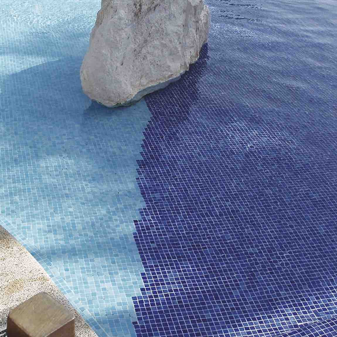 Recycled Glass Tile Dark Blue featured on a resort-style swimming pool