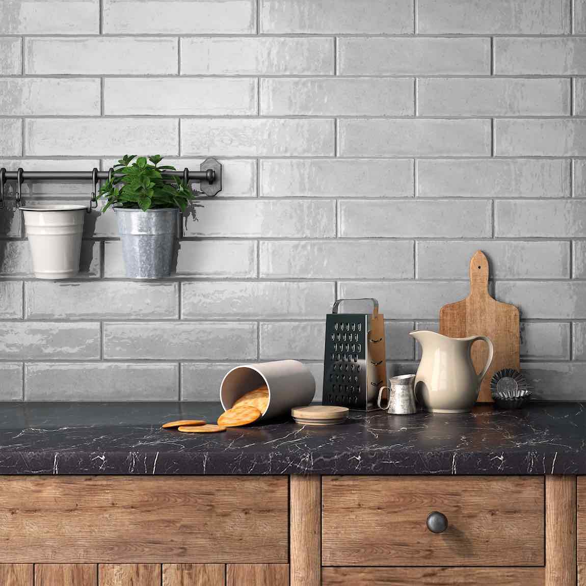 Subway Ceramic Tile Crackled Zellige Tender Gray 3x12 Glossy featured on a kitchen backsplash