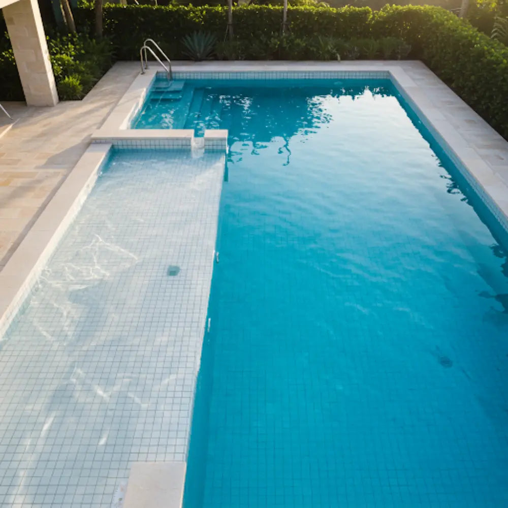 White Matte Porcelain Mosaic Tile adding a chic touch to the pool area with its modern, refined look.