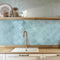 Zellij Distressed Porcelain Tile Aqua 6x6 featured on a kitchen backsplash