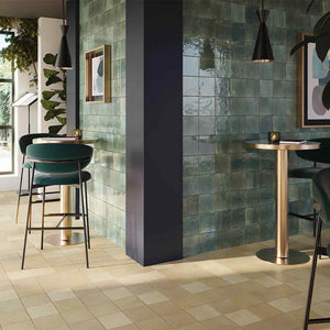 Zellij Distressed Porcelain Tile Rainforest 6x6 featured on a cafe restaurant wall